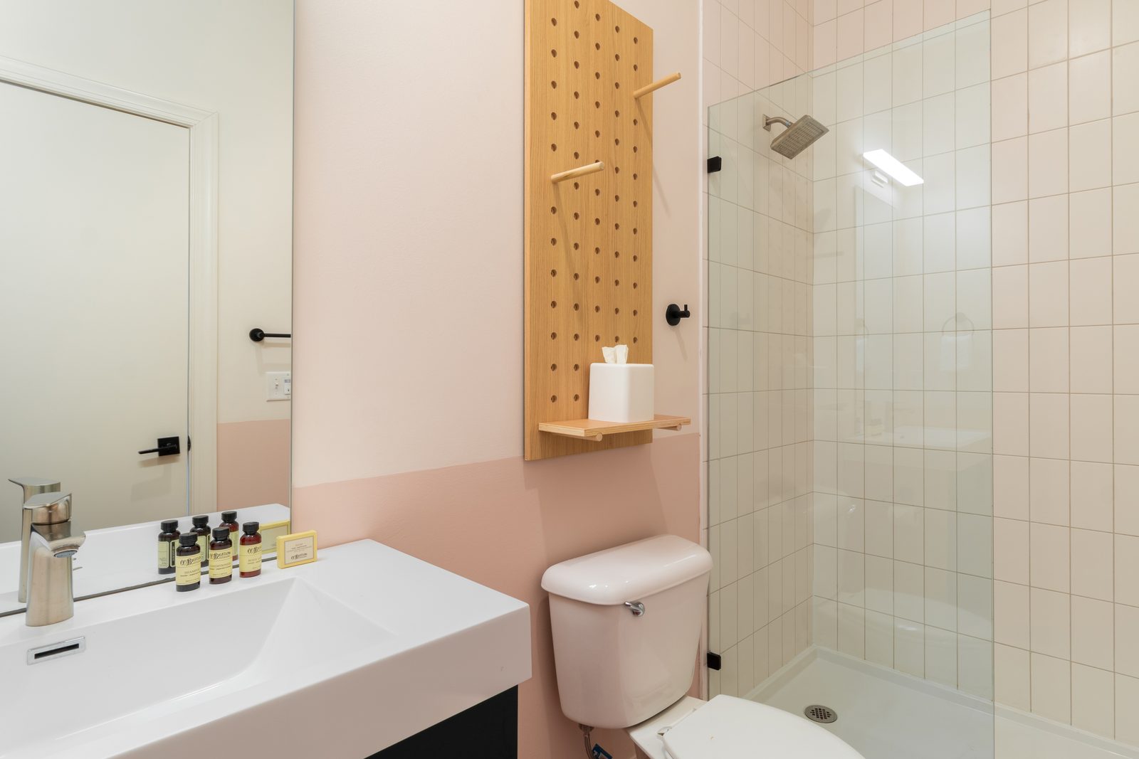 Bathroom with walk-in shower at The Conway